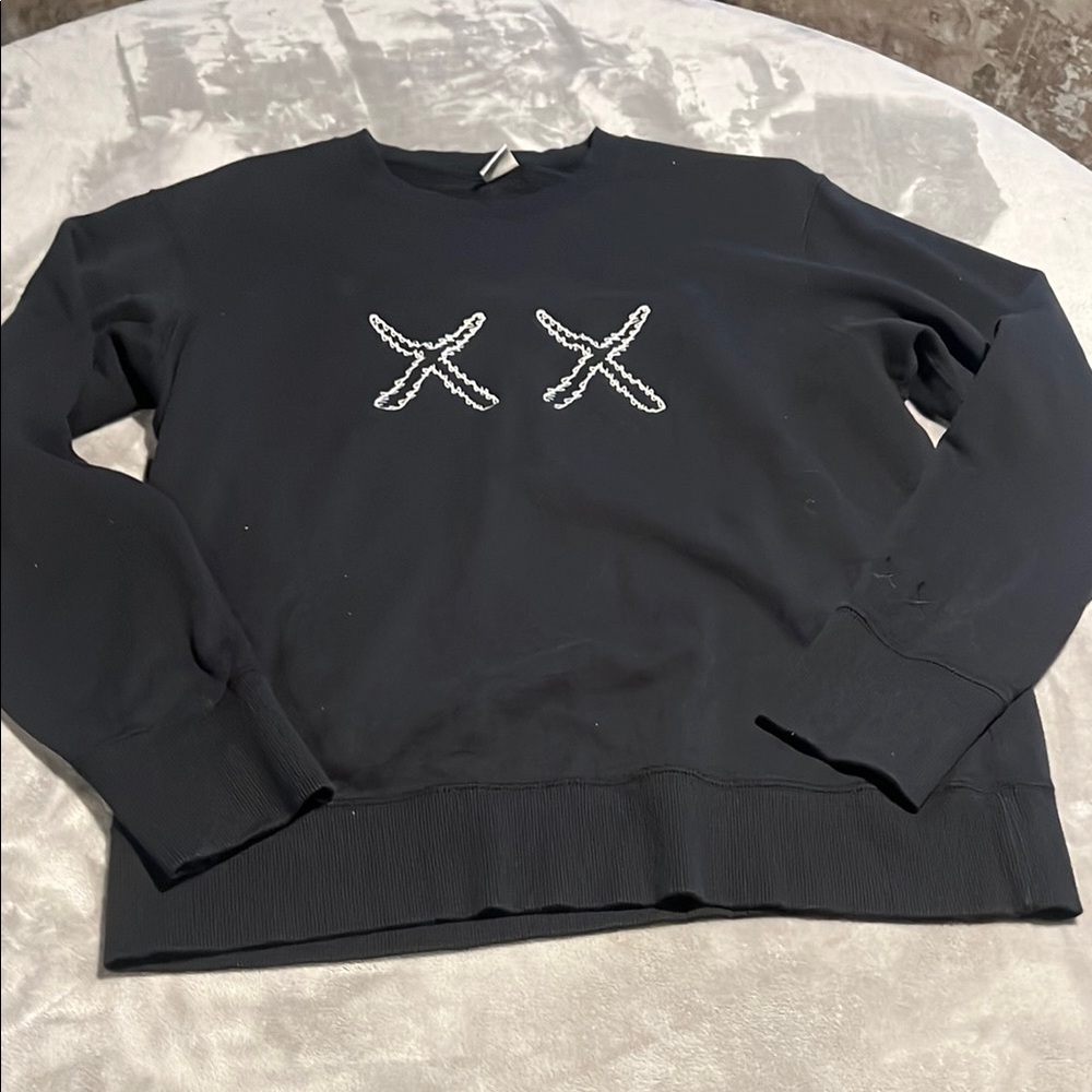 KAWS Black Crewneck Sweater with Iconic XX Design. Size Medium